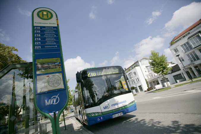 Regional bus at a bus stop from below