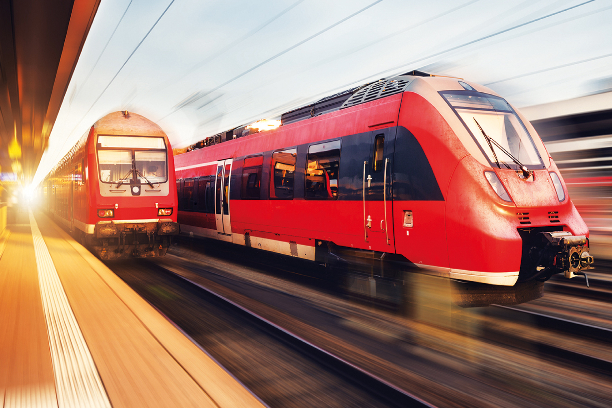 DB Regionalzüge mit Bewegungseffekt am Bahnhof